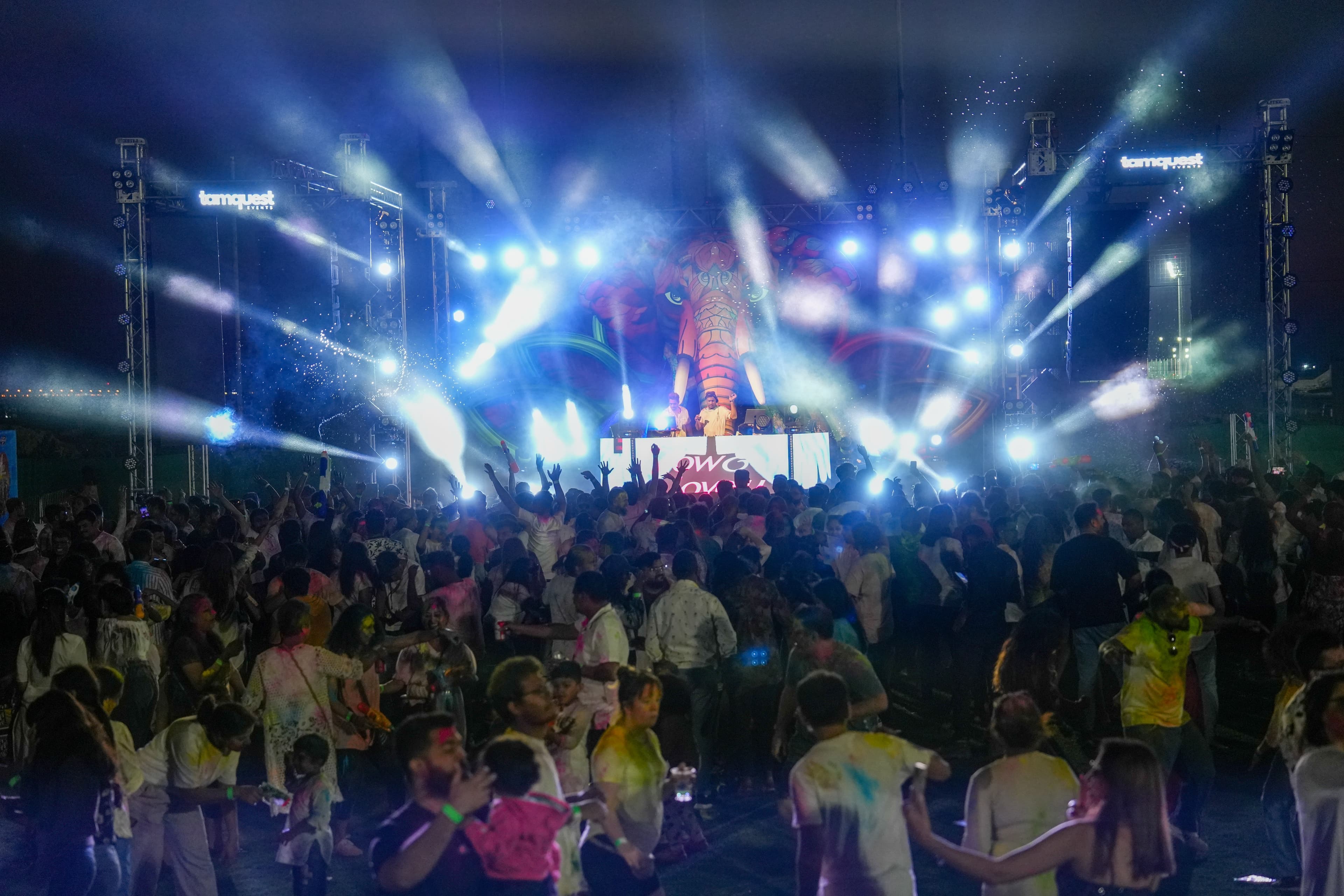 Holi event stage and colors